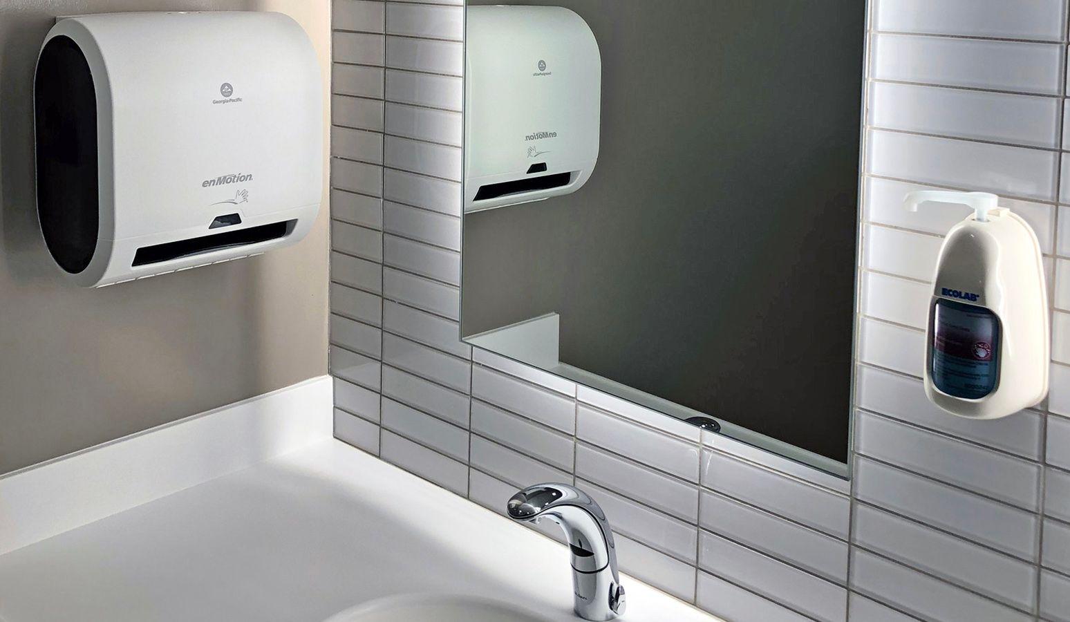 an image of a bathroom sink and mirror