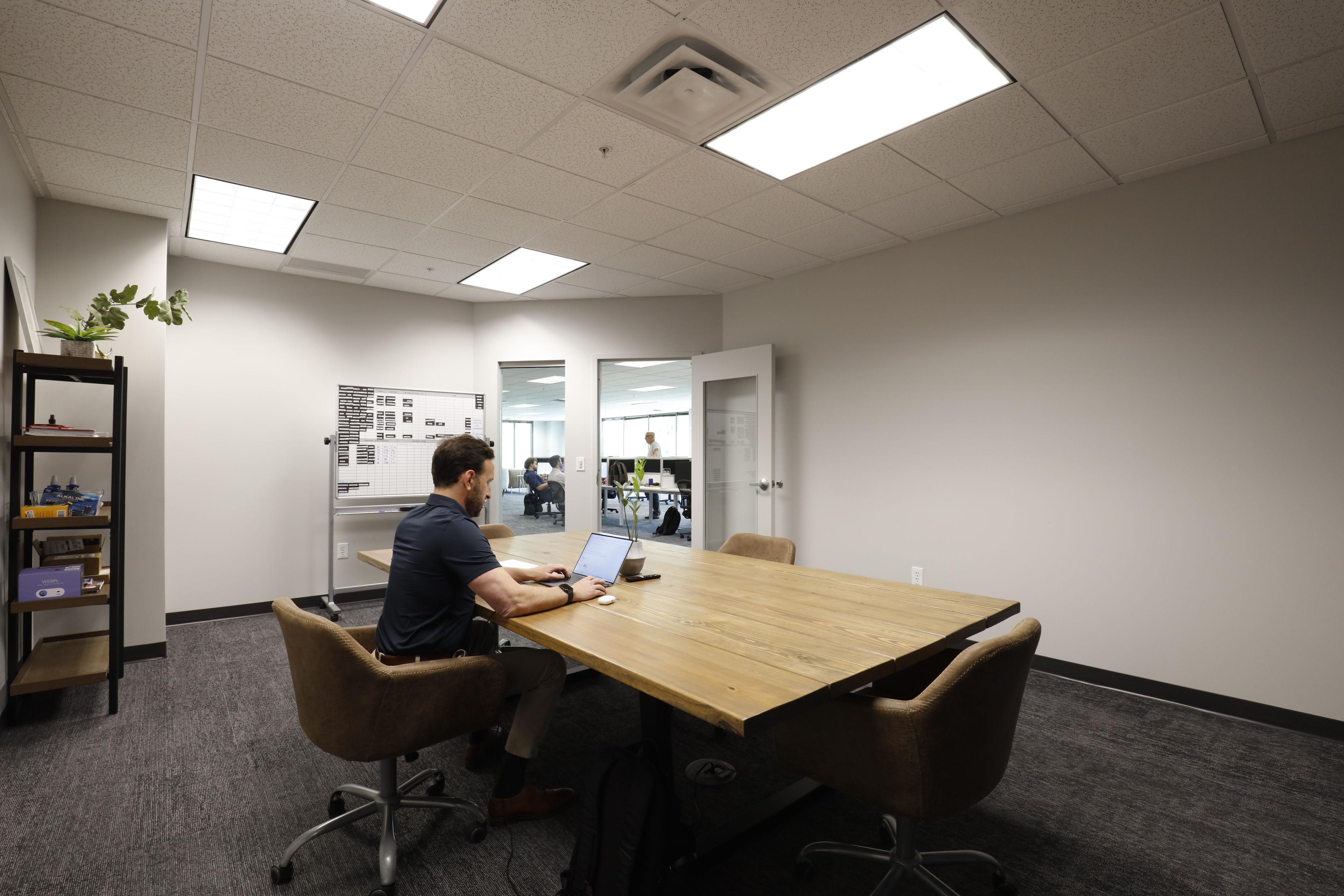 an image of a person in a conference space