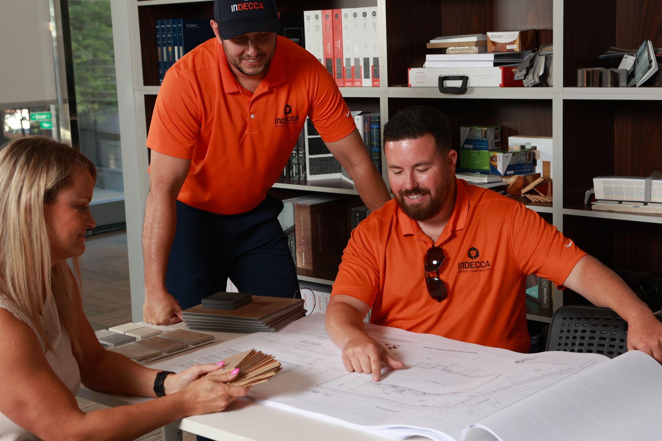 four people around a planning table