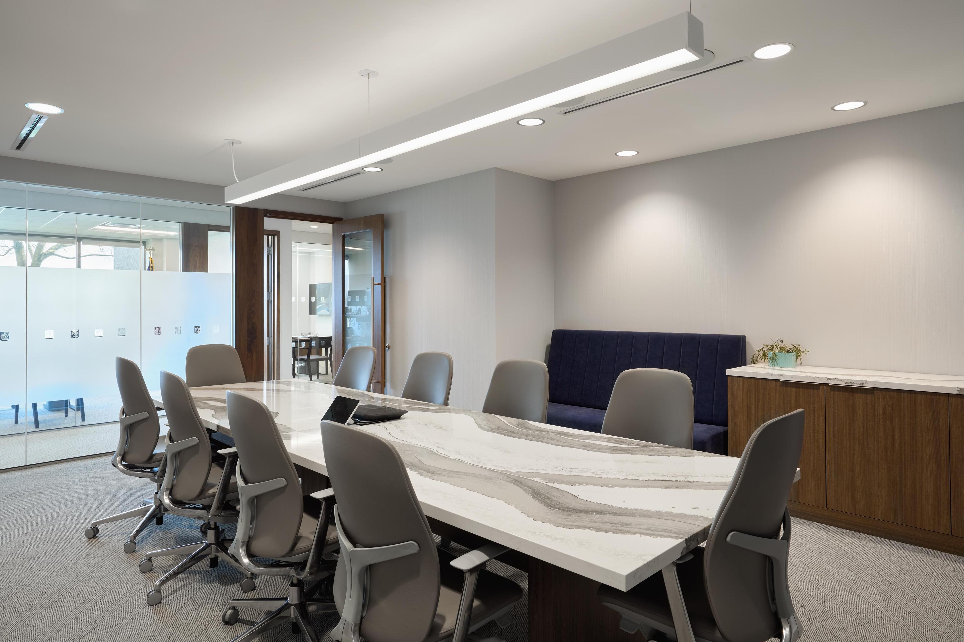 Meeting room with large table and chairs