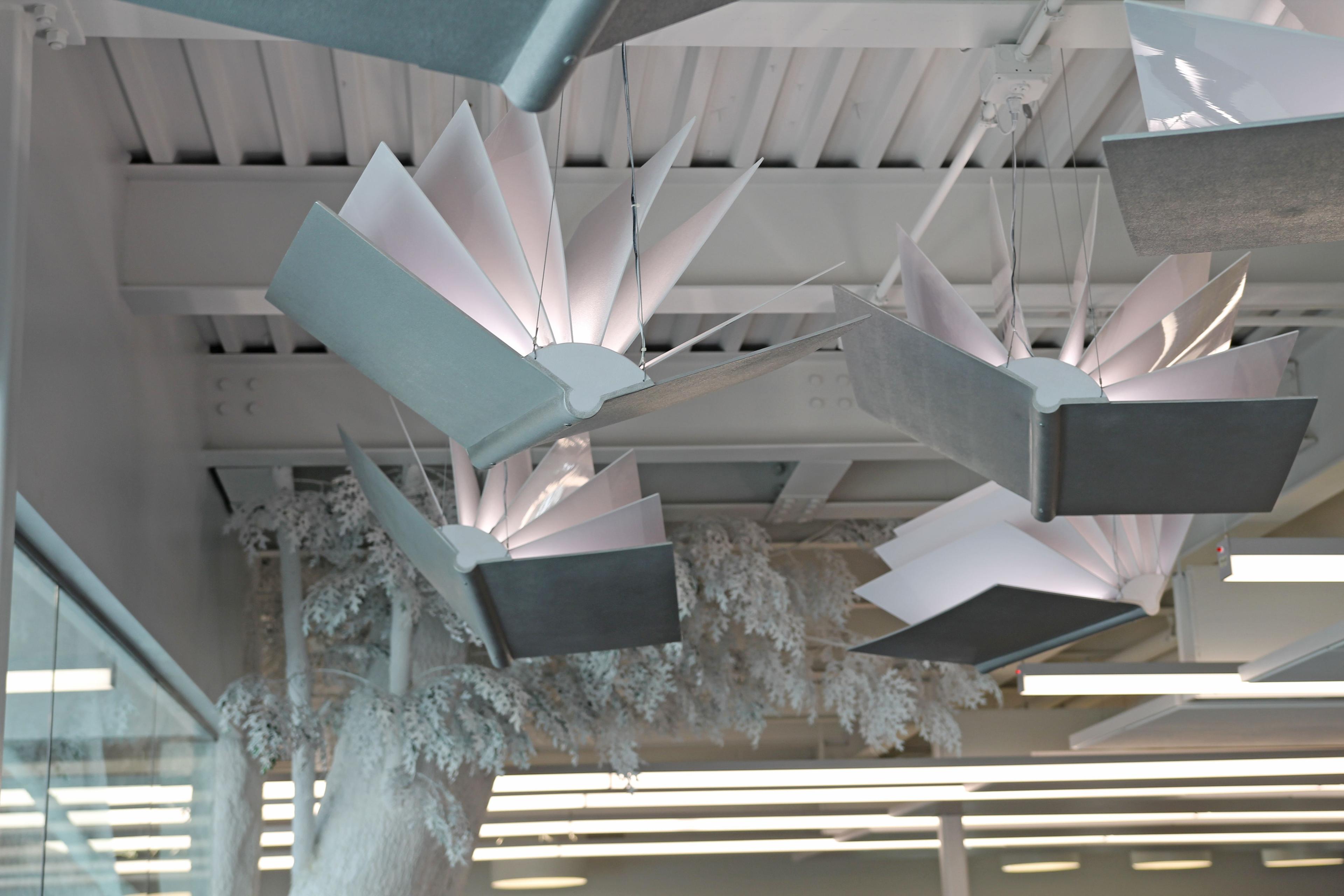 light fixtures in the shape of opened books